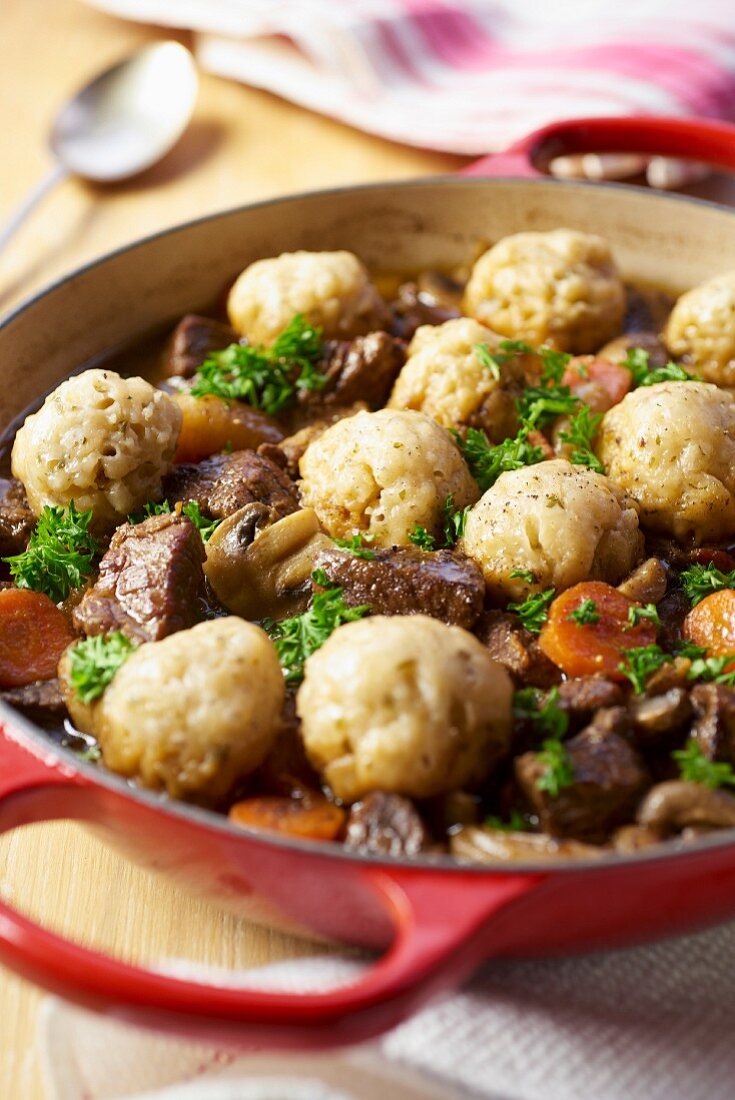 Beef casserole with dumplings and carrots