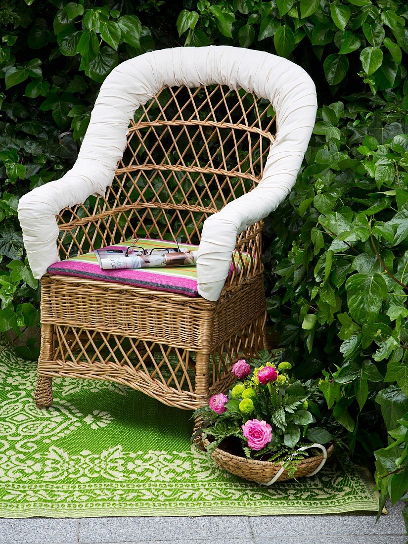 DIY - wicker armchair with seat cushion and white cushioned backrest edge
