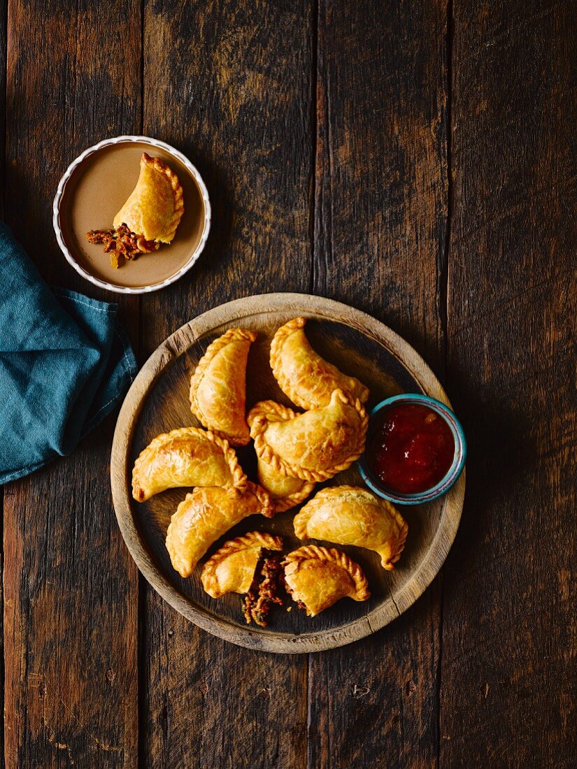 Empanadas filled with beef and olives (seen from above)