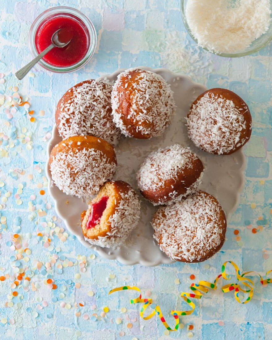 Doughnuts with coconut flakes and jam