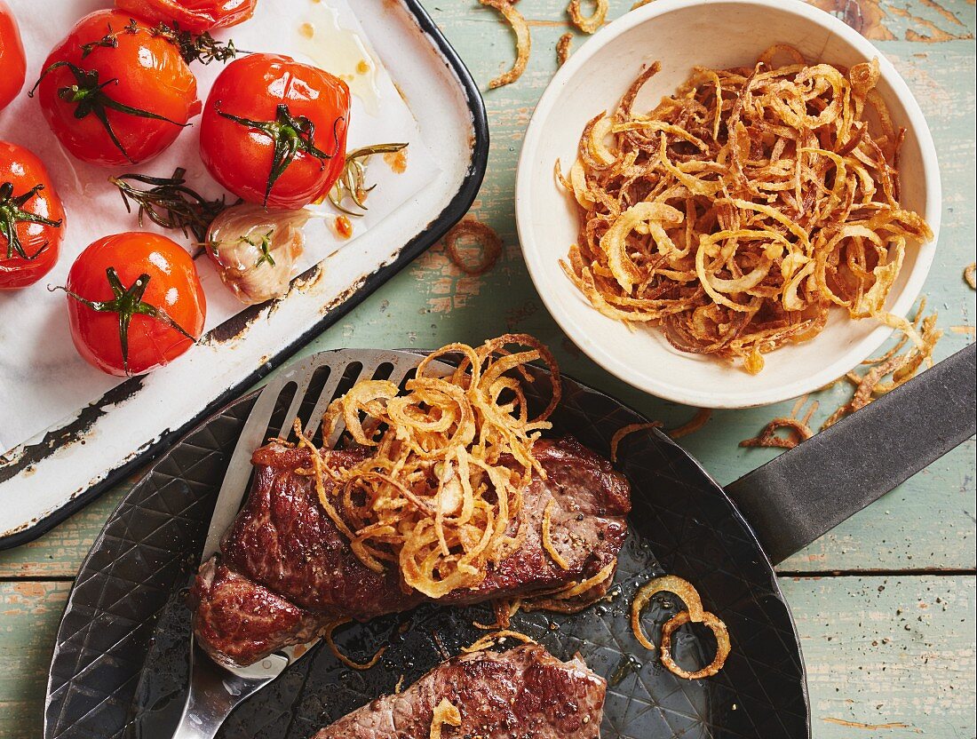 Roast beef with roast onions with oven-roasted tomatoes