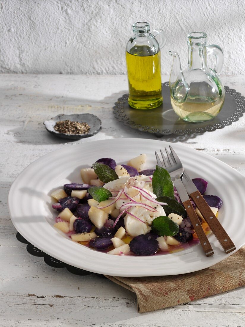 Purple potato salad with pears and sheep's cheese
