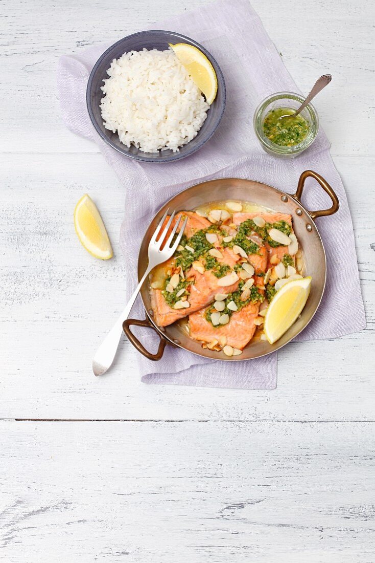 Baked salmon trout with gremolata and rice