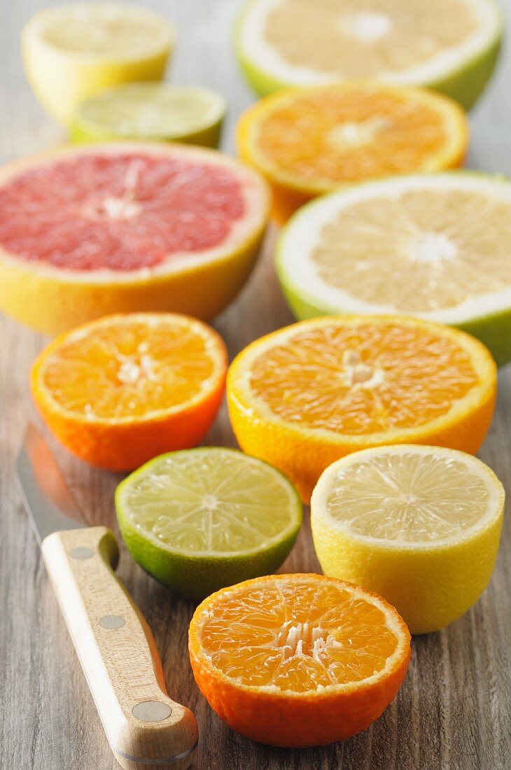 Assorted citrus fruit, halved