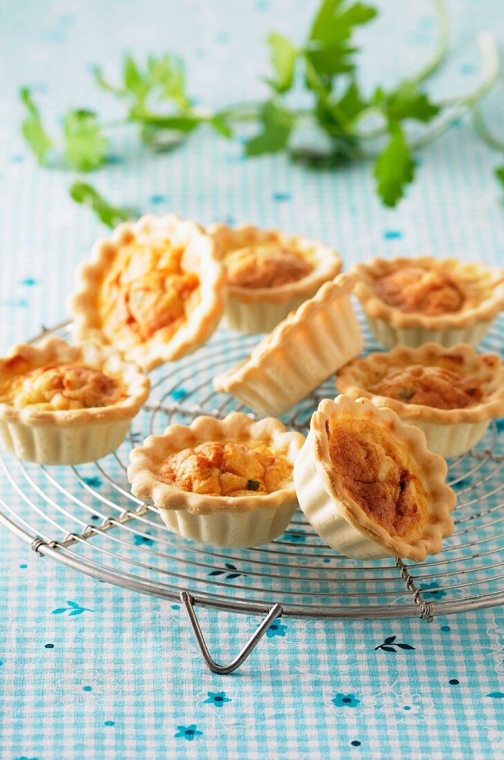 Spicy mini quiche on a cooling rack