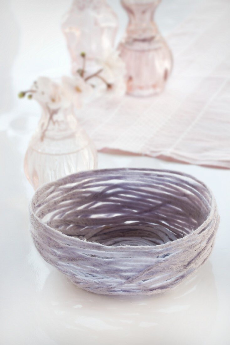 Pastel basket hand-made from yarn