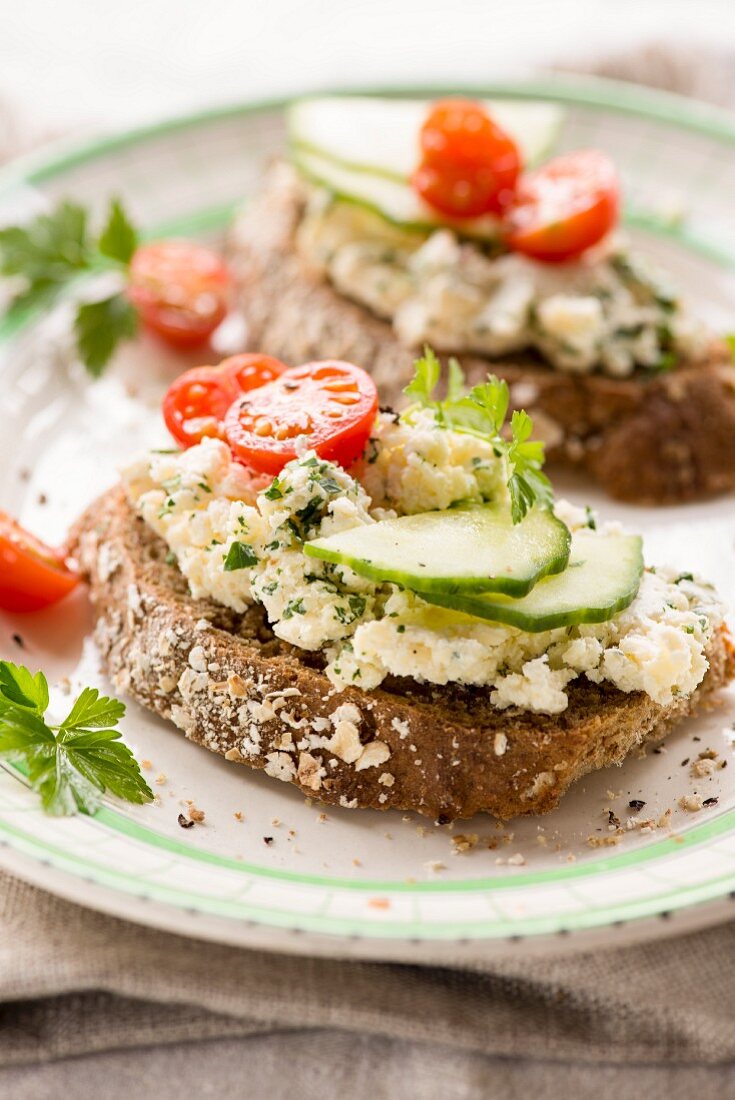 Cheddar pâté on toast with cucumber and tomato