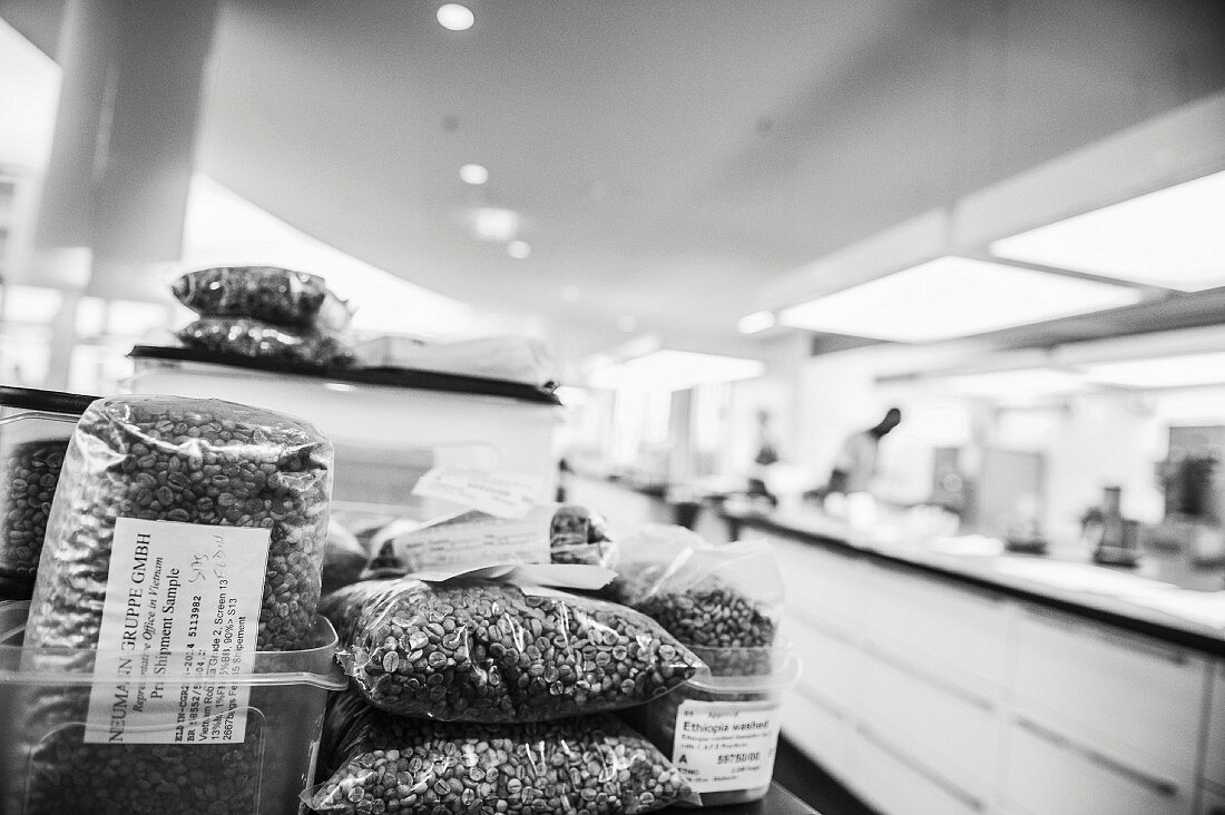 Stacked sacks of coffee (black and white photo)