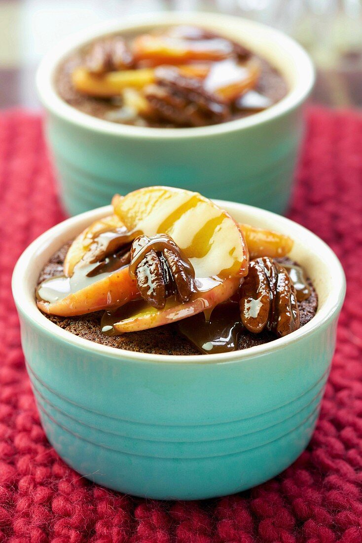 Sticky toffee puddings with apples and pecan nuts