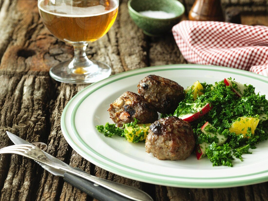 Meatballs with a kale and apple salad