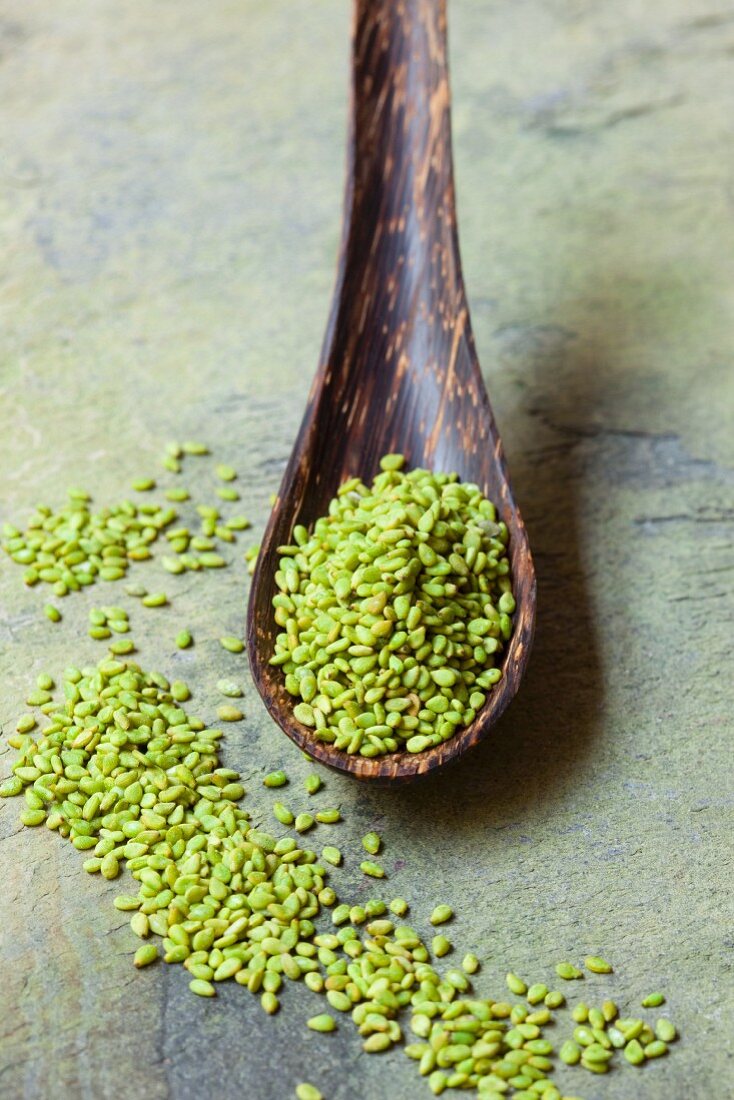 Wasabi sesame seeds on a wooden spoon
