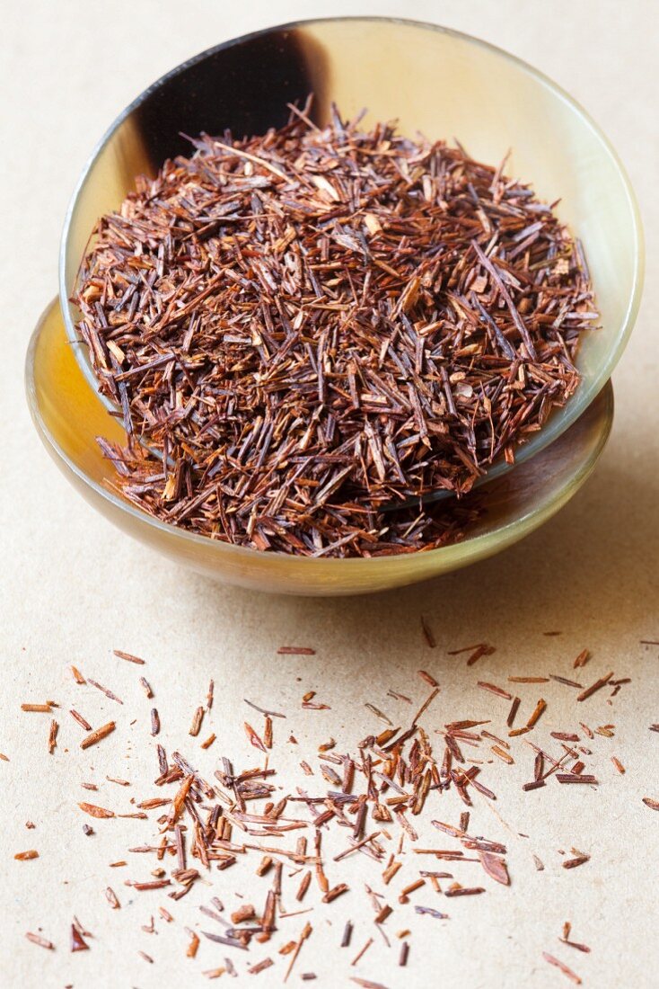 A bowl of rooibos tea leaves