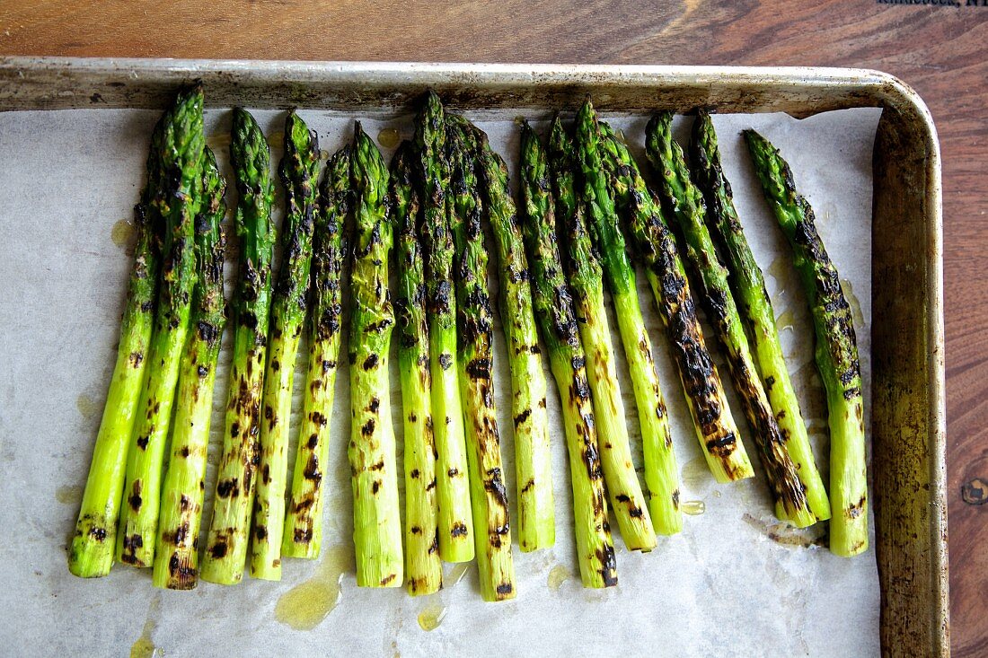 Roasted asparagus on parchment paper