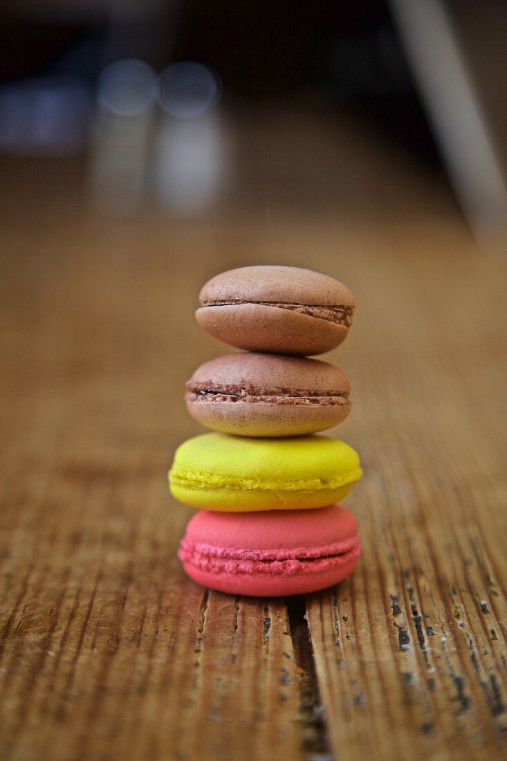 A stack of macaroons on a wooden table