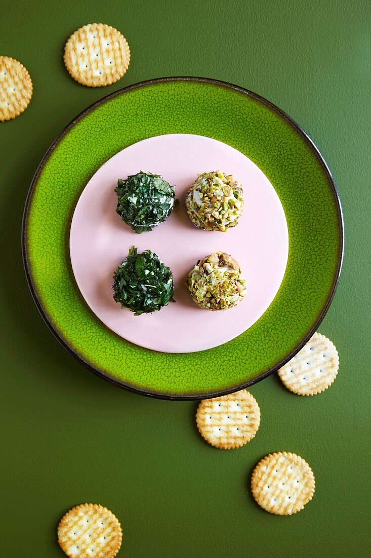 Cream cheese balls with herbs and chopped nuts