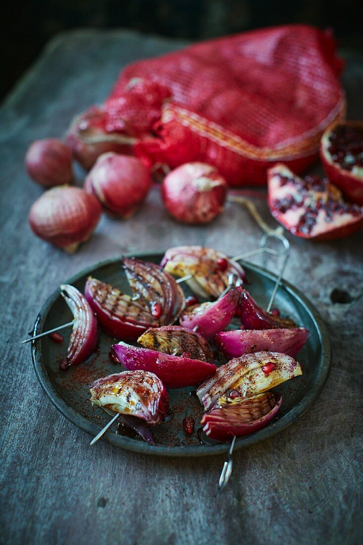 Grilled red onions with pomegranate molasses