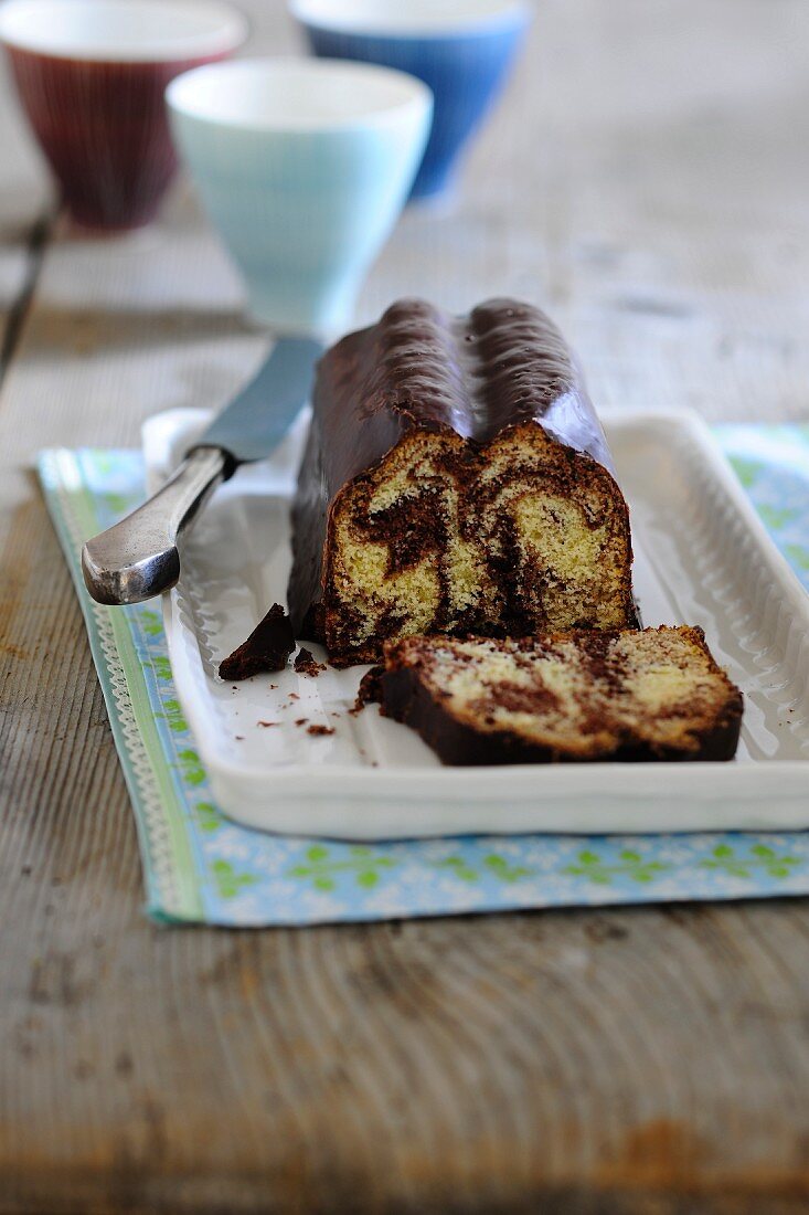 Marbled Bundt Cake with Chocolate Gananche, Slice Removed