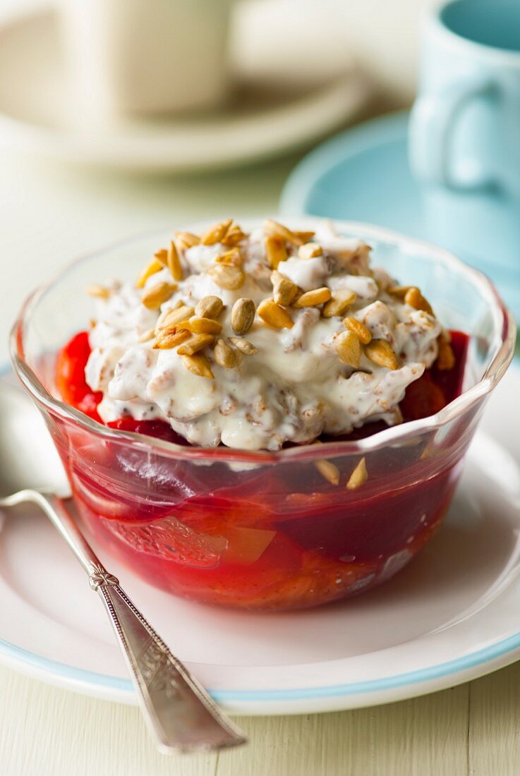 Muesli on plum and apple compote