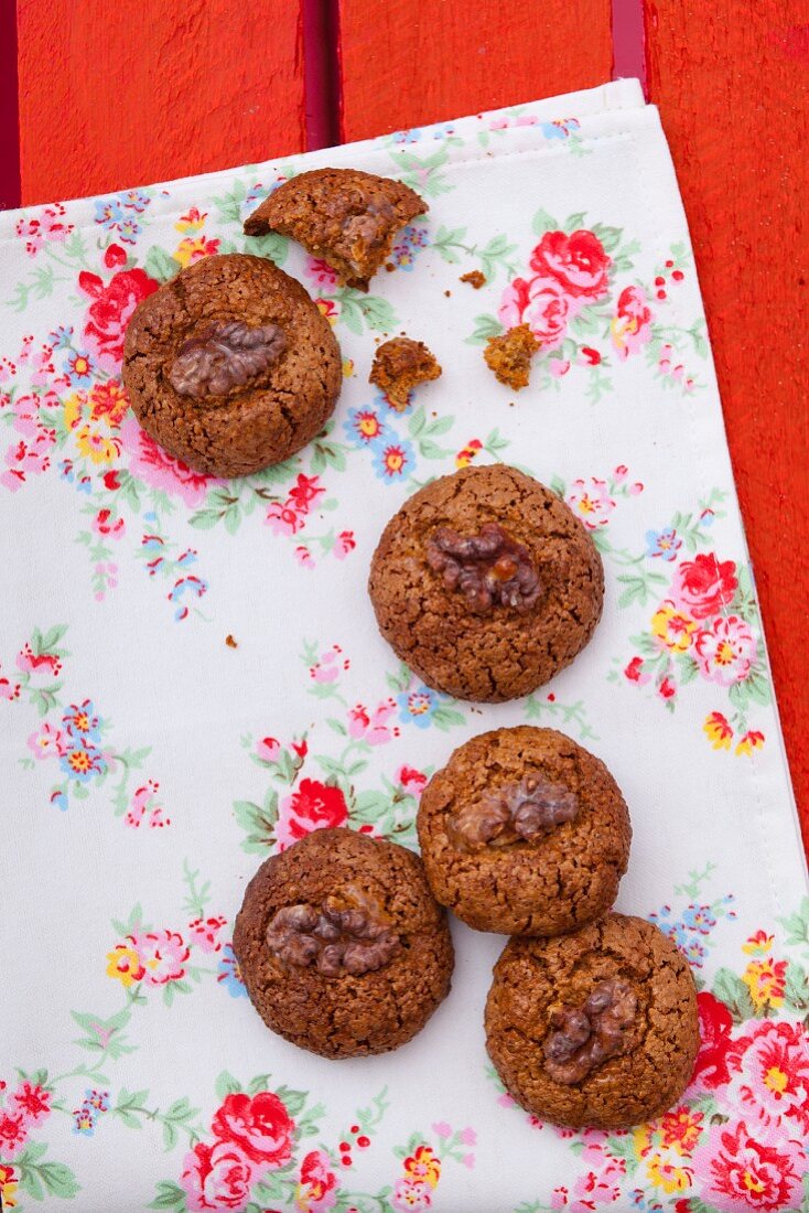 Walnut biscuits on a floral cloth