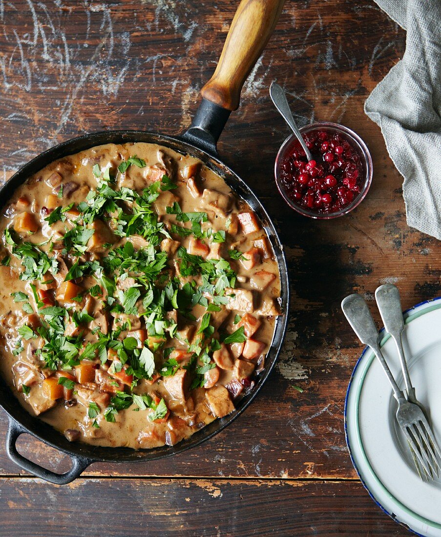 Vegetarian ragout with quorn, lingonberry sauce and chopped parsley