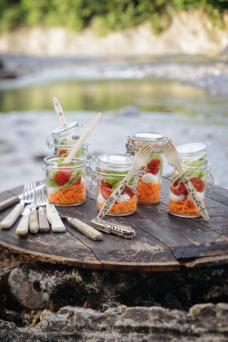Layered salads in mason jars for river-bank picnic