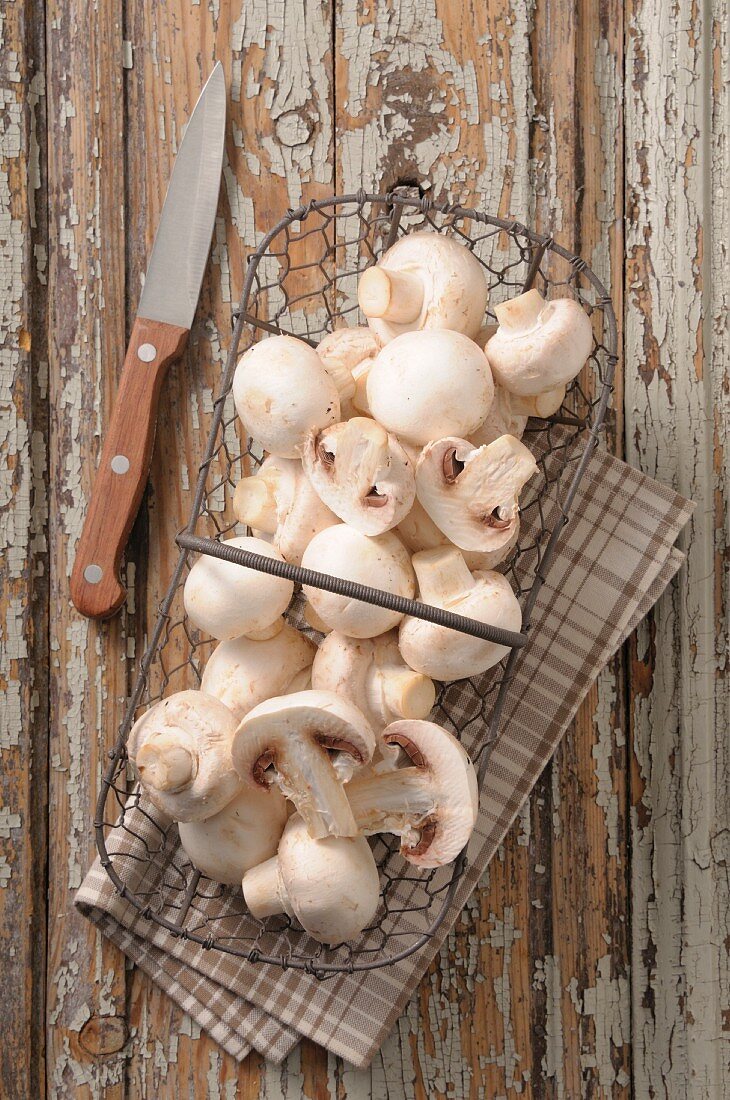 Mushrooms in a wire basket