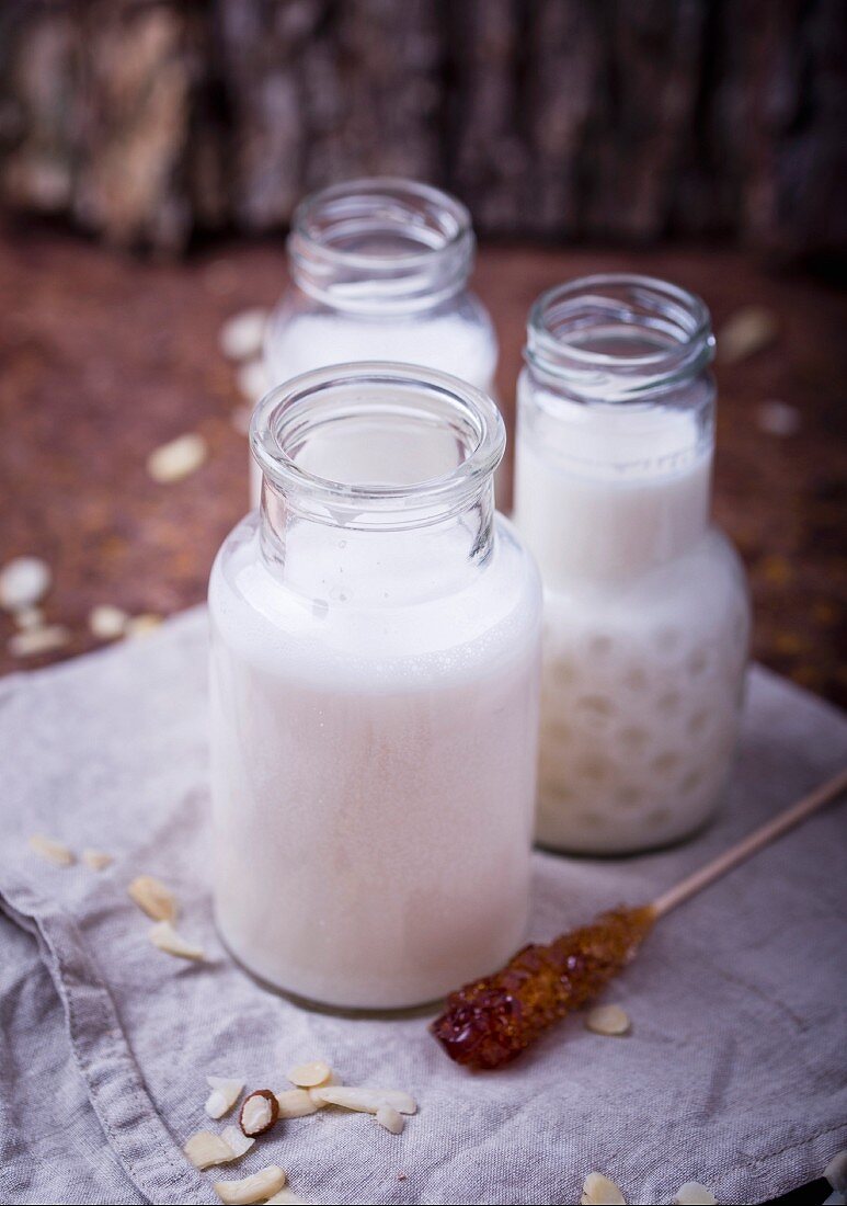 Almond milk and a stick of rock sugar