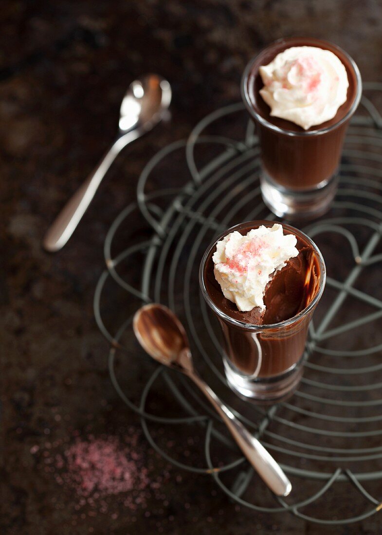 Chocolate cream deserts with whipped cream