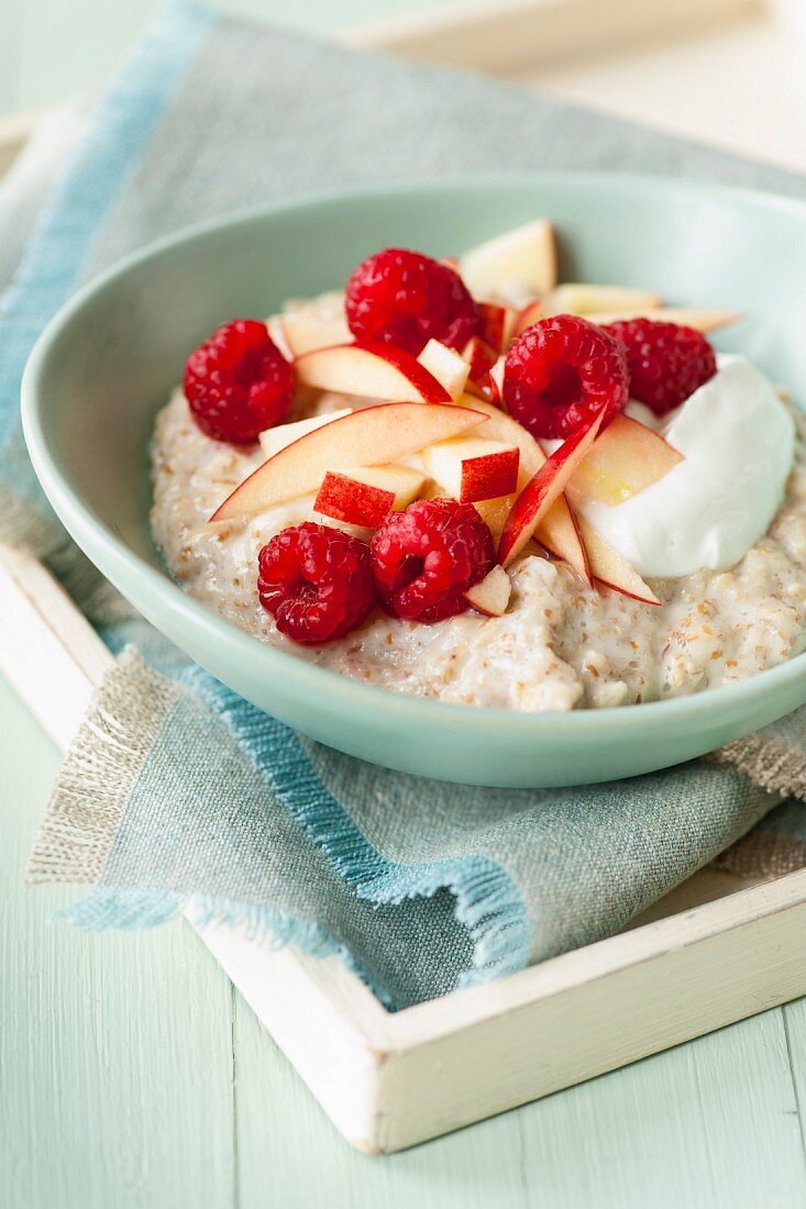 Porridge with apples and raspberries