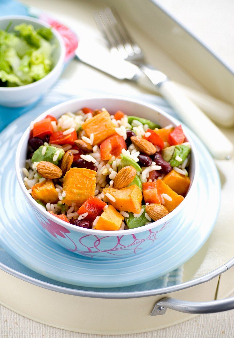 Roast sweet potato salad with rice and almonds