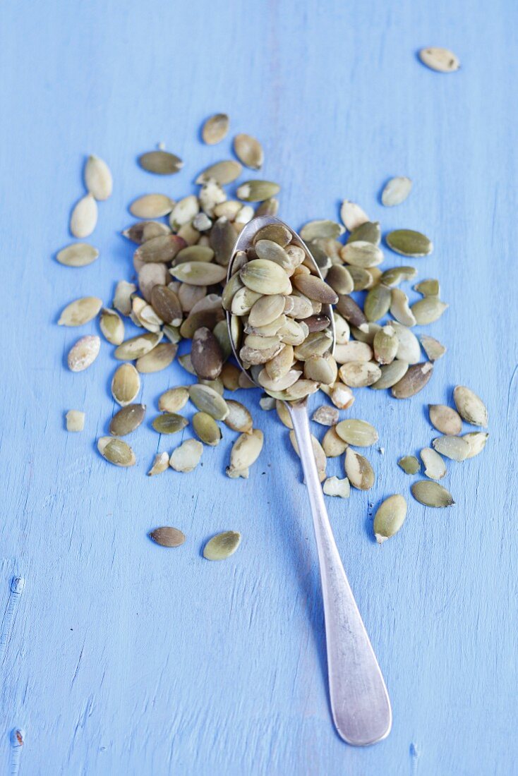 Pumpkin seeds with a spoon