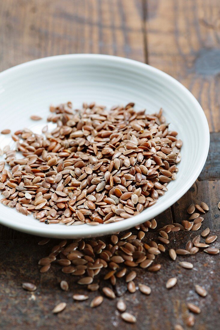 A bowl of brown flax seeds