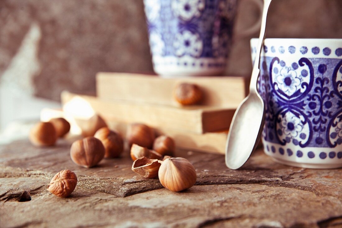 Coffee cups and hazelnuts