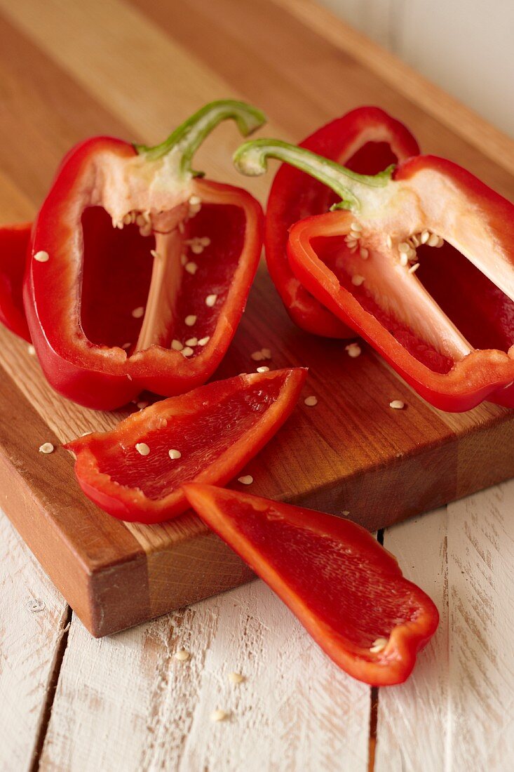 Halved and sliced red peppers