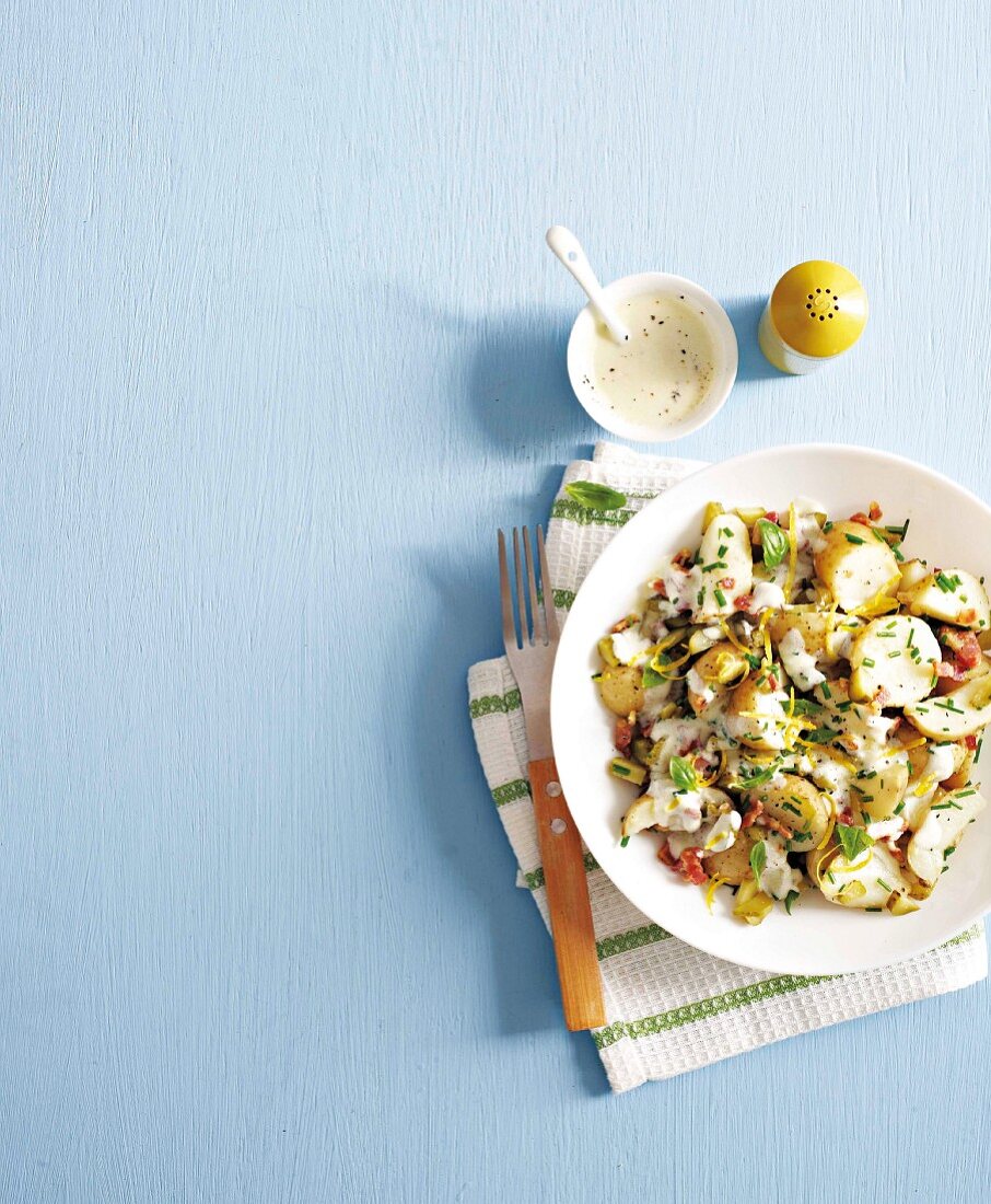 Potato salad with gherkins, ham and yoghurt dressing