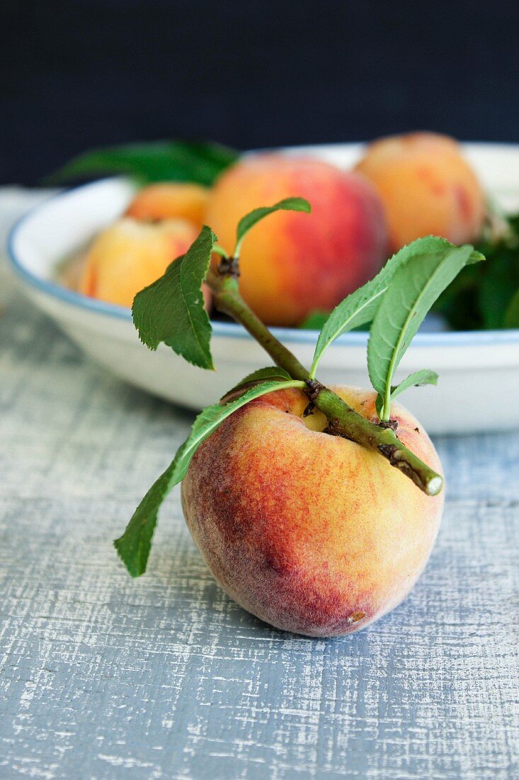 Peaches with leaves