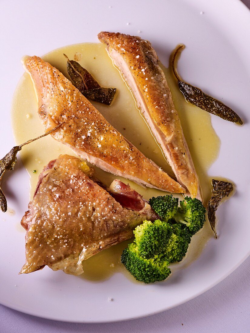 Chicken breast with fried herbs and broccoli
