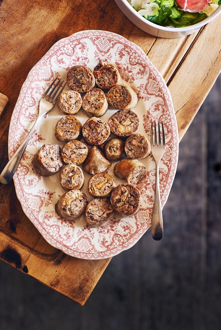 Grilled andouillette sausages (seen from above)