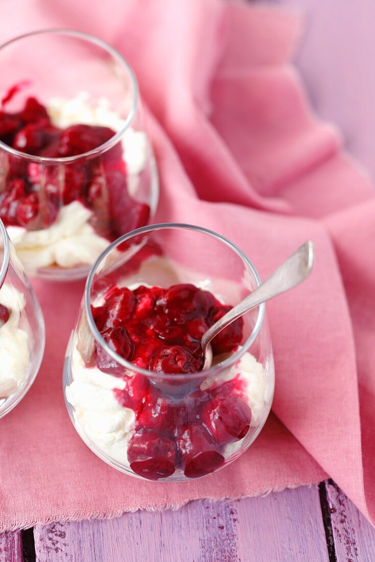 Glasses of cherry cheesecake