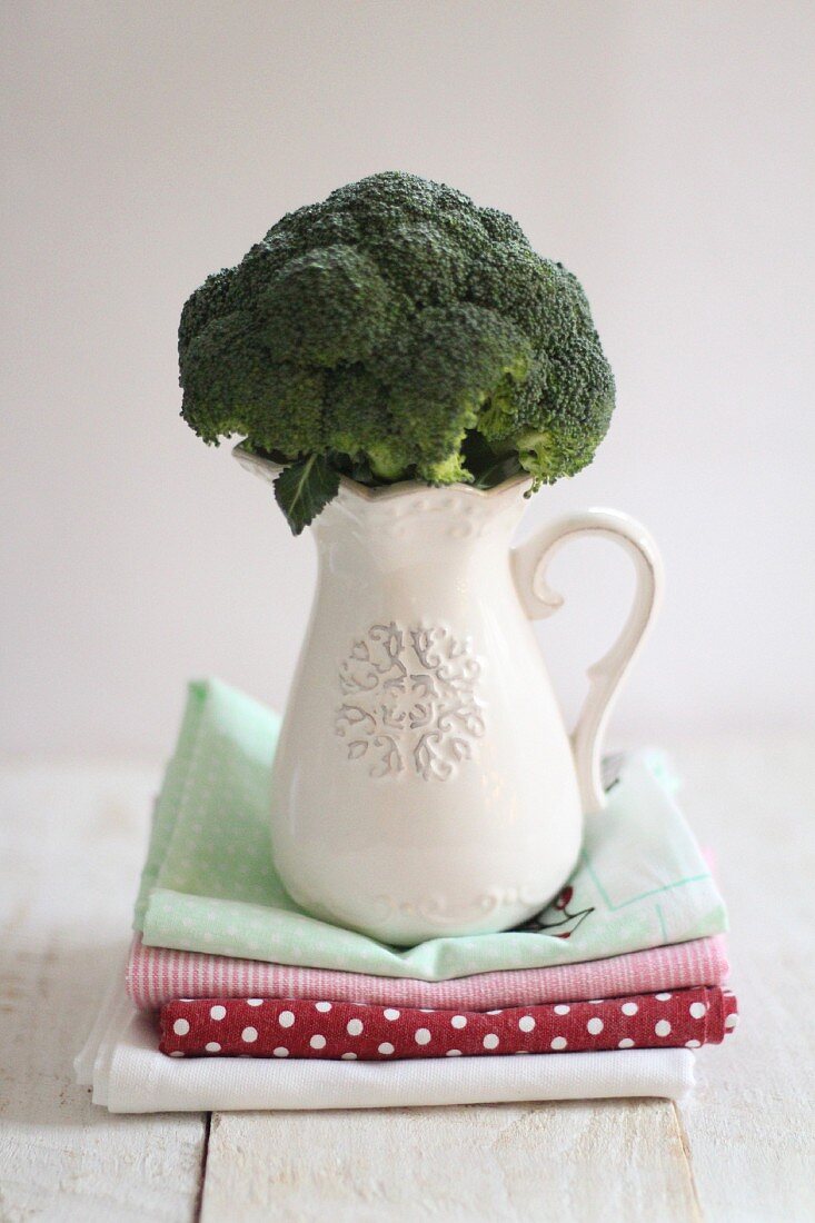 Broccoli in a white porcelain jug