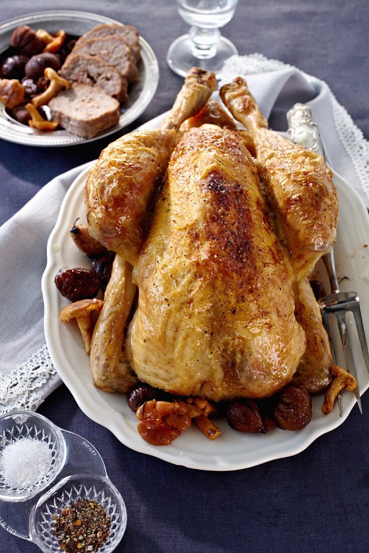 Stuffed capon with chestnuts and chanterelle mushrooms