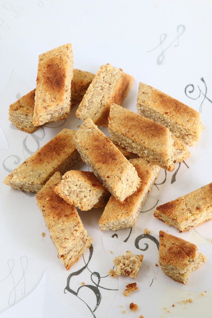 Gluten-free almond cakes with cinnamon cut into diamond shapes