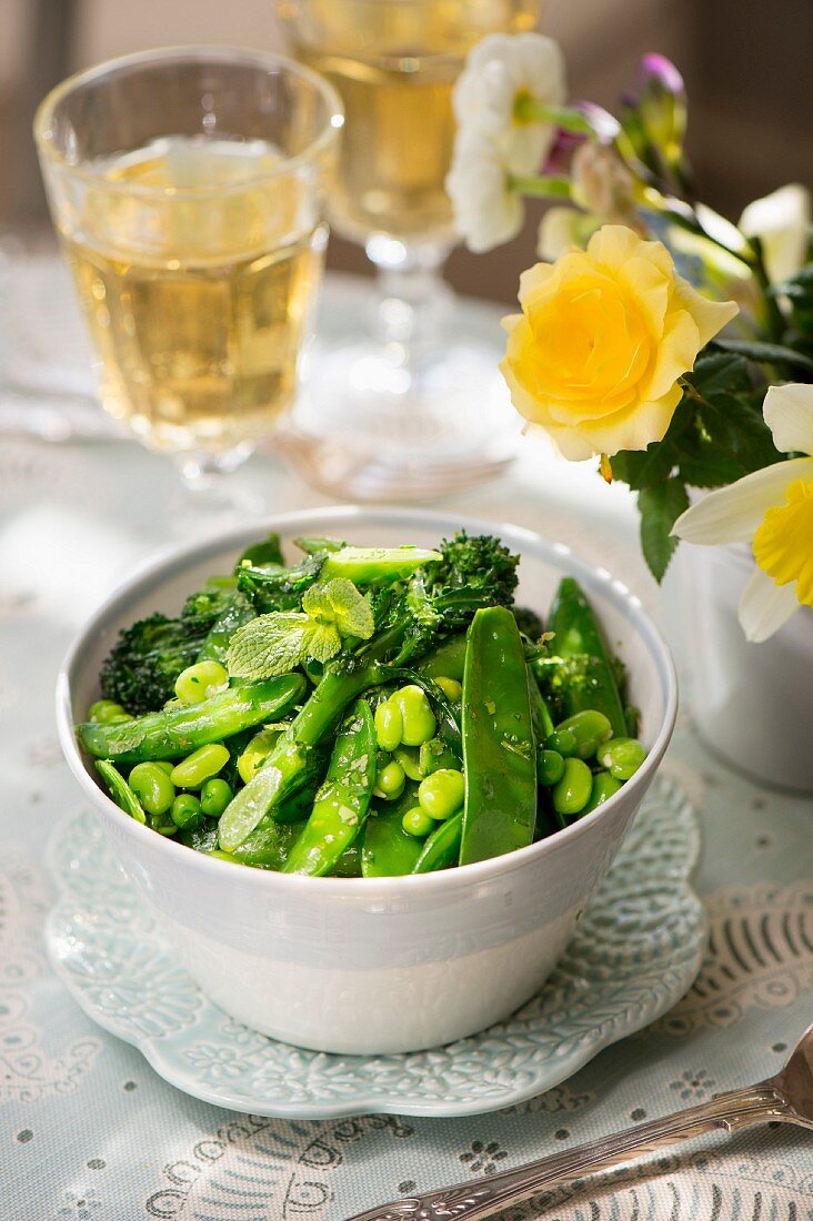 Mange tout with beans, peas and broccoli as a side dish for Easter