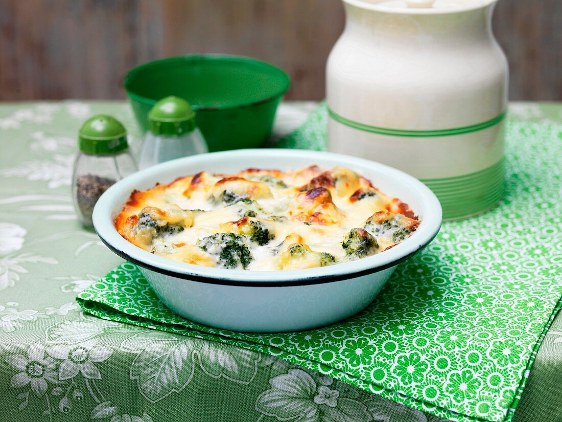 Broccoli and cheese bake in a ceramic dish