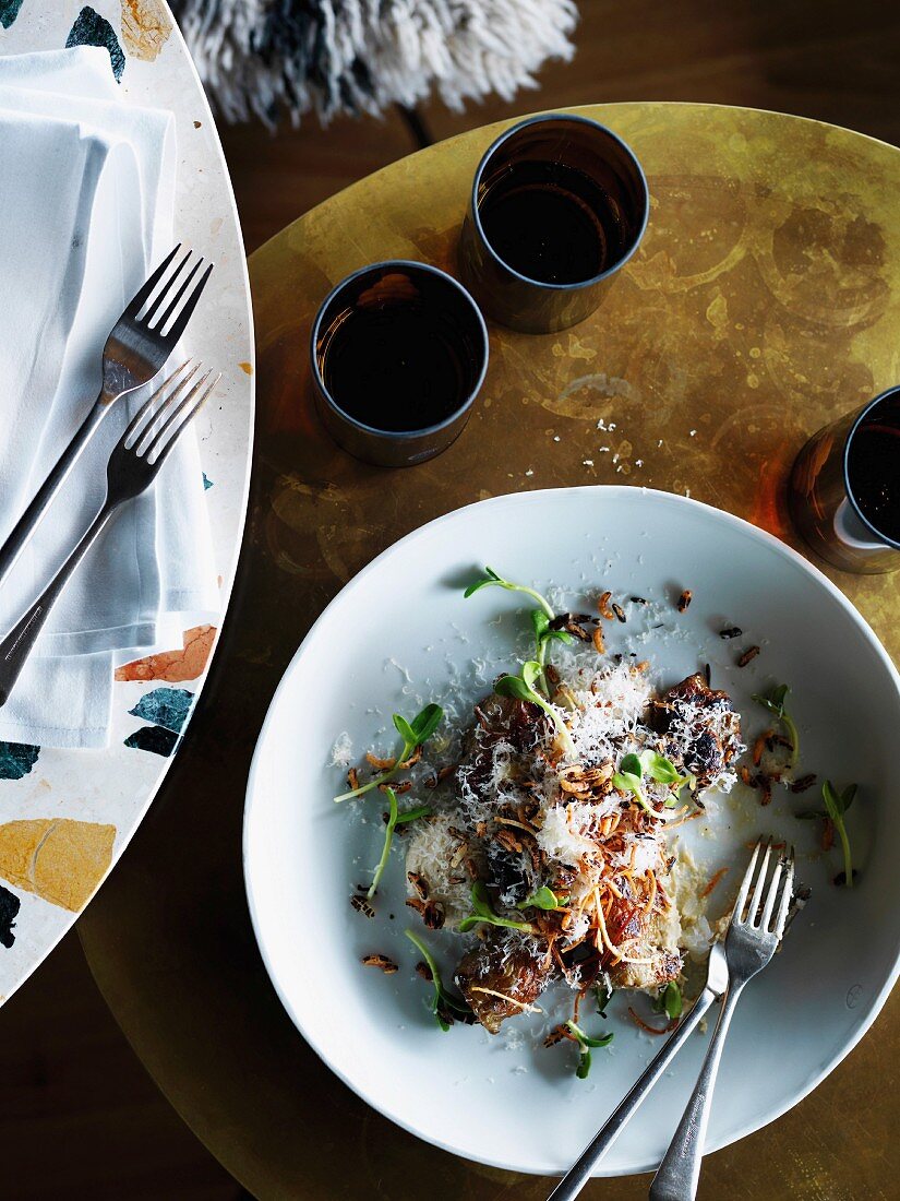 Celery and Jerusalem artichoke with puffed rice and Parmesan cheese