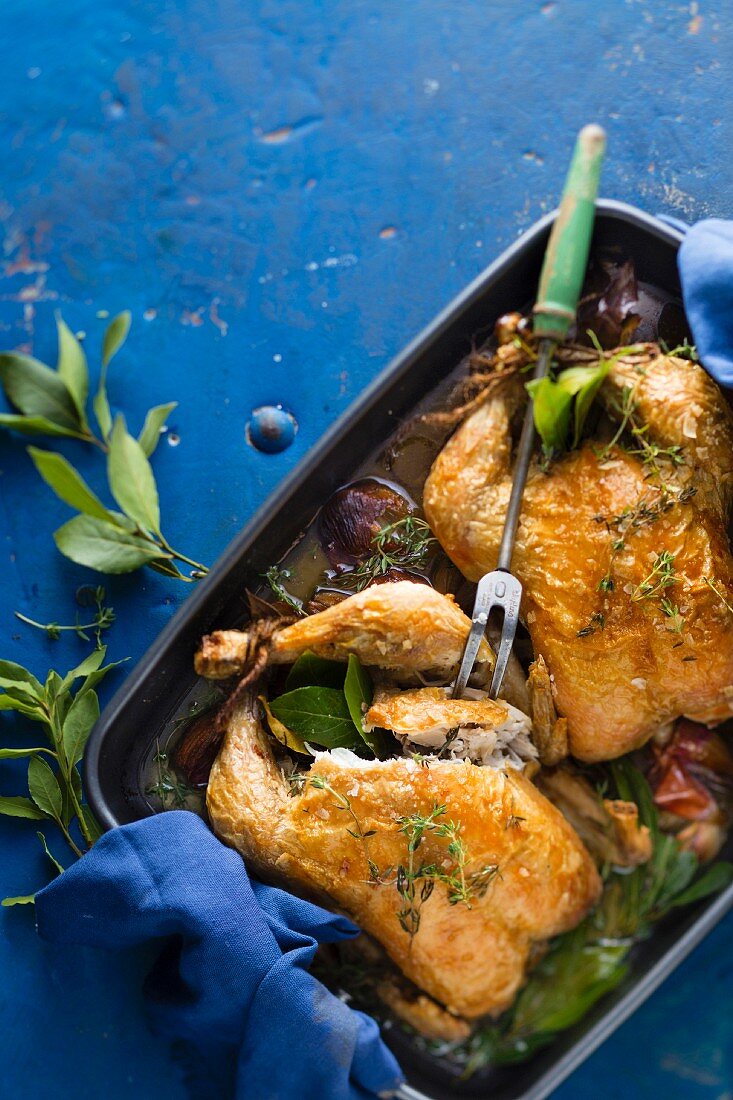 Roast chicken with bay leaves and garlic