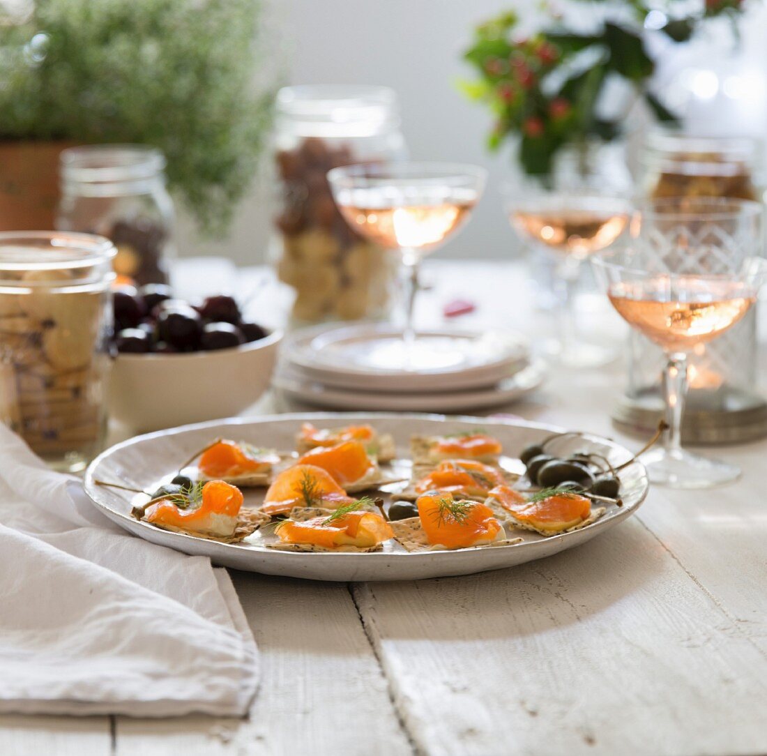 Salmon canapés on a table laid for a party