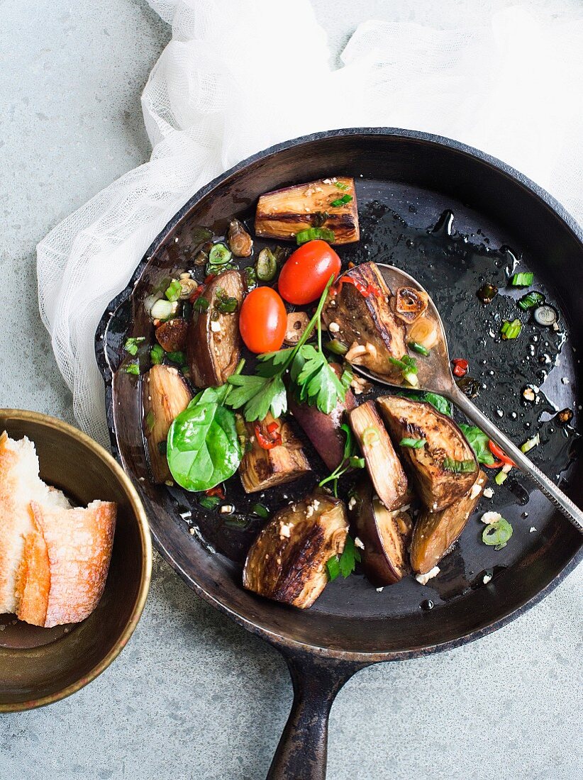 Fried aubergines with chilli and parsley