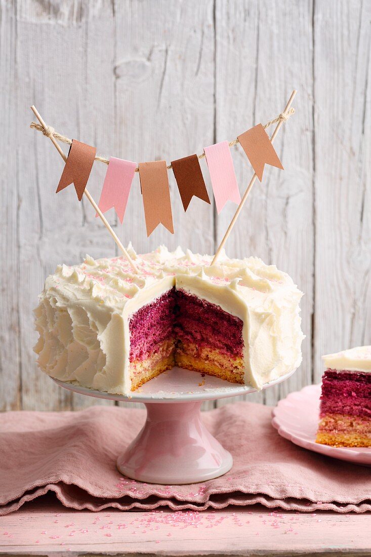 Raspberry and buttercream 'Surprice' cake