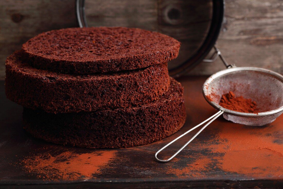 Three chocolate cake bases